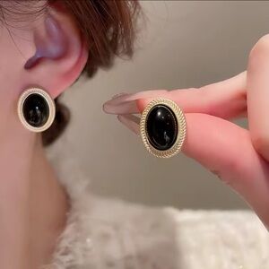 Elegant Black and Gold Oval Earrings